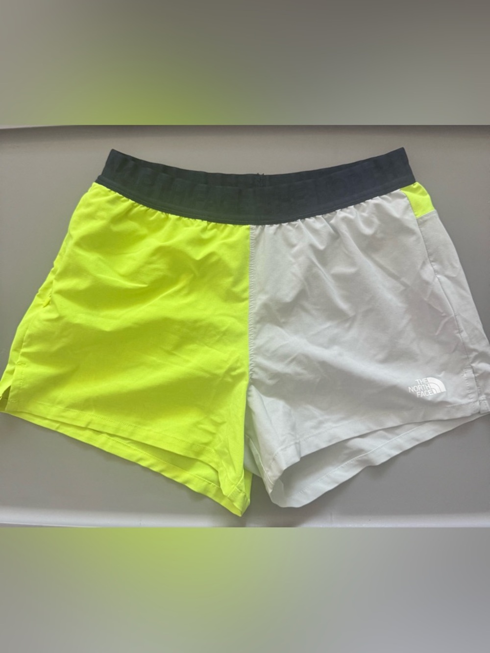The North Face Neon Yellow and White Athletic Shorts with Navy Blue Waistband